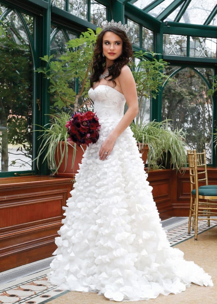 Gown: Oleg Cassini at David’s Bridal (CWG660, $1,850)