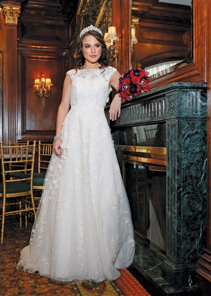 Gown: Oleg Cassini at David’s Bridal (CWG659, $1,450)