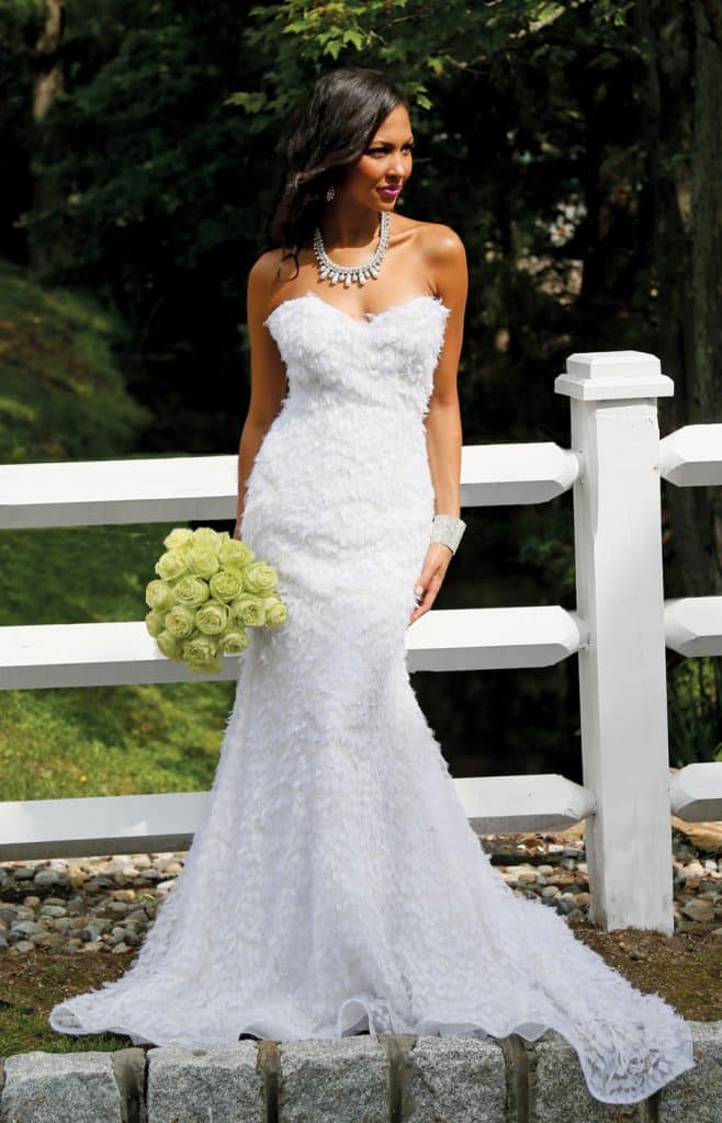 Gown: Lucia Rodriguez (LW1947, $7,200). Bouquet: Ariston Flowers