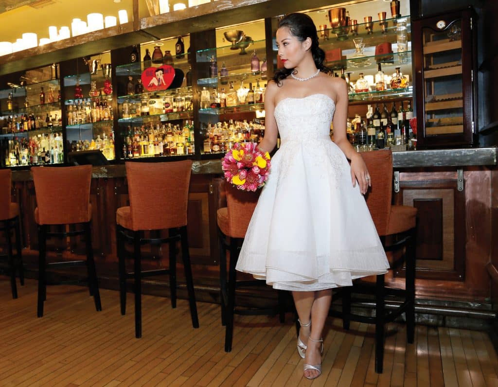 Oleg Cassini (CWG742, $850), Ariston Florist