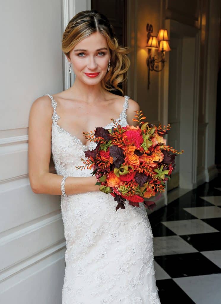 Bouquet: PMK Floral Arts. Gown: Eve of Milady (4349, $6250)
