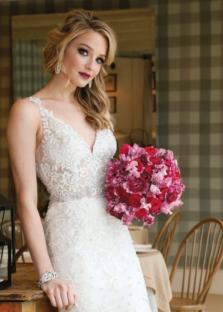 Bouquet: PMK Floral Arts. Gown: Eve of Milady (#348)