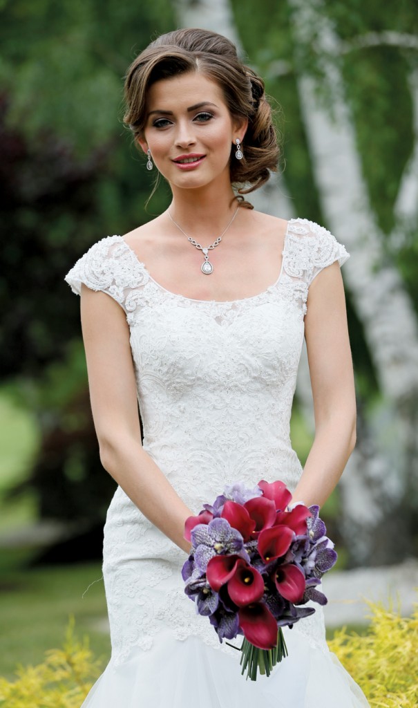 Gown: Oleg Cassini at David's Bridal (CWG750, $1,358), Ariston Flowers