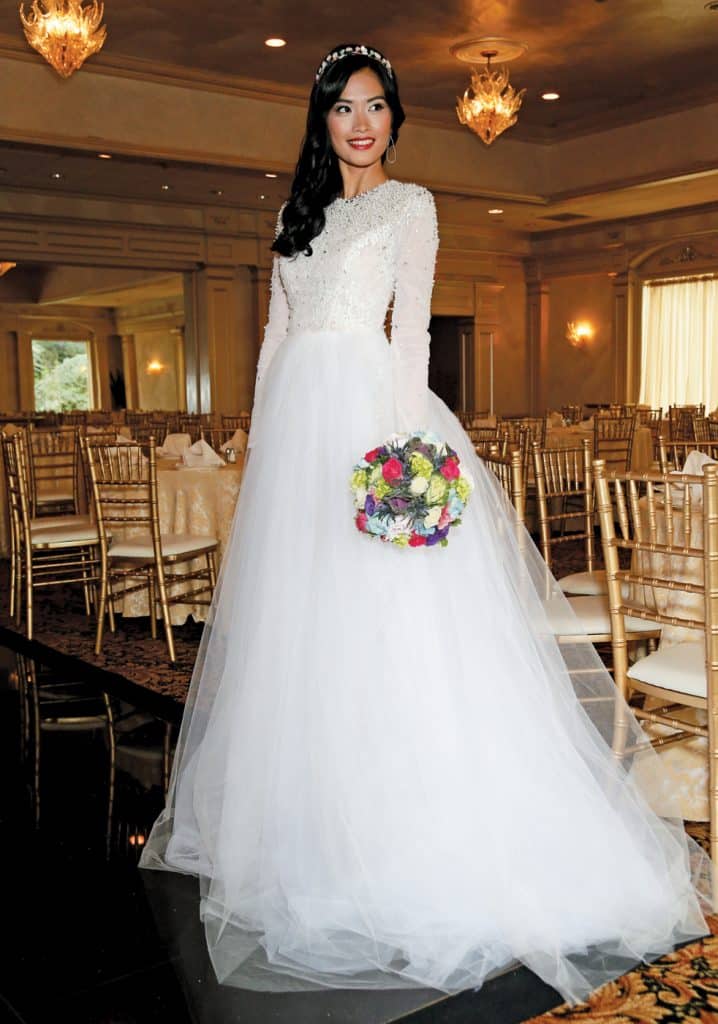 Gown: Lucia Rodriguez (LRW907, $6,000), Henry's Florist