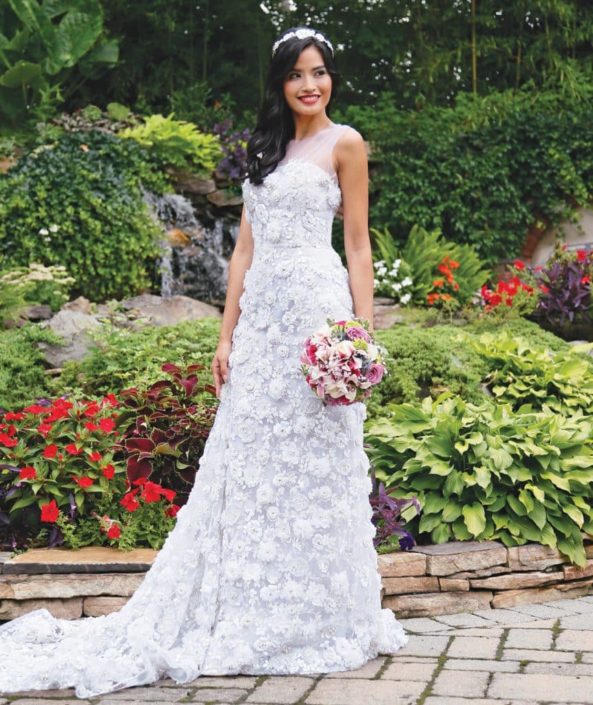 Gown: Lucia Rodriguez (LRW909, $12,000), Henry's Florist