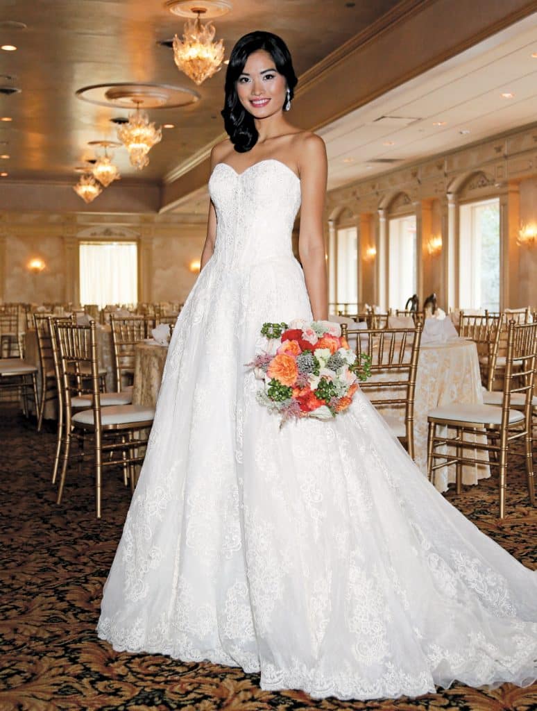 Gown: Oleg Cassini at David's Bridal (CWG749, $1,758), Torcianna Florals