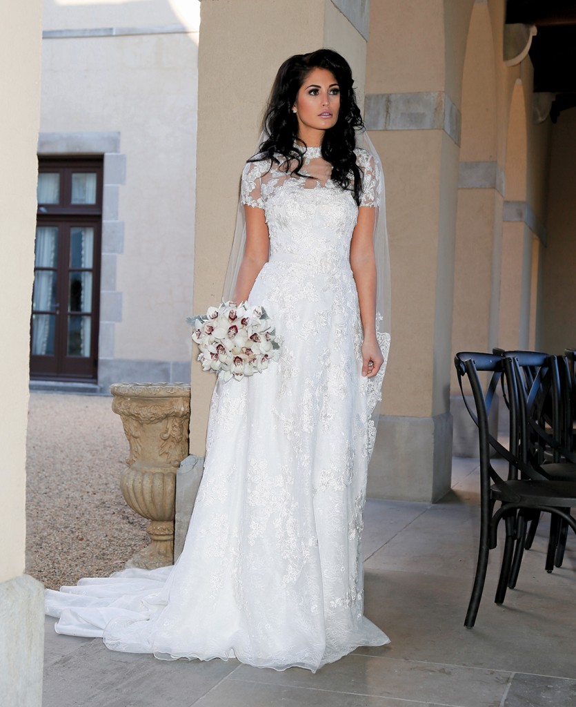 Gown: Oleg Cassini at David's Bridal (CWG790, $1,258), Ariston Flowers