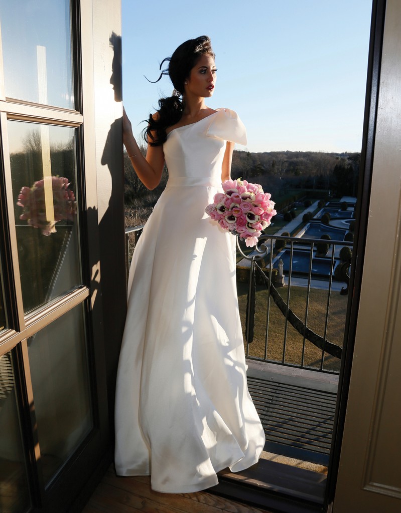 Gown: Oleg Cassini at David's Bridal (CWG793, $658), Ariston Flowers, Earrings-KVO Collections, Bracelet as Hairpiece-David's