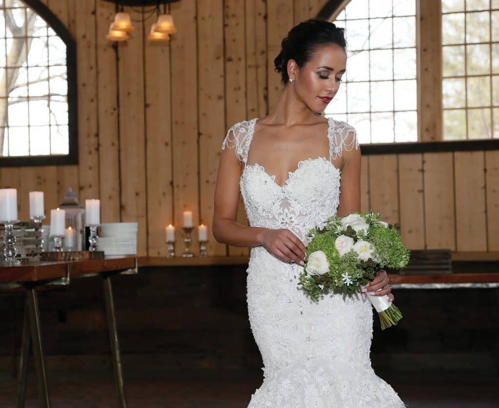 Gown: Eve of Milady (1607), Bouquet: Mitch Kolby Events, Jewelry: KVO Collections