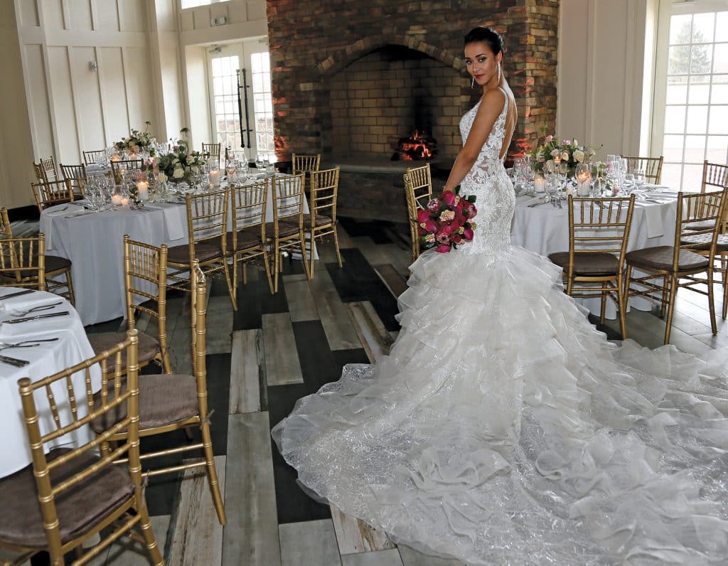 Gown: Eve of Milady (1611), Bouquet: Mitch Kolby Events, Jewelry: David's Bridal