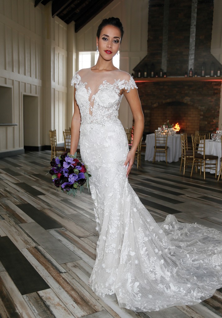 Gown: Eve of Milady (1613), Bouquet: Mitch Kolby Events, Jewelry: David's Bridal