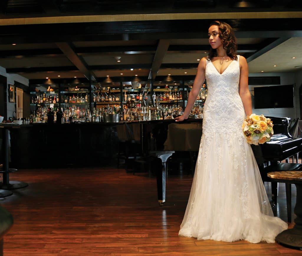 Gown: Oleg Cassini at David's Bridal (CWG795, $1,158), Ariston Flowers, Jewelry: David's Bridal