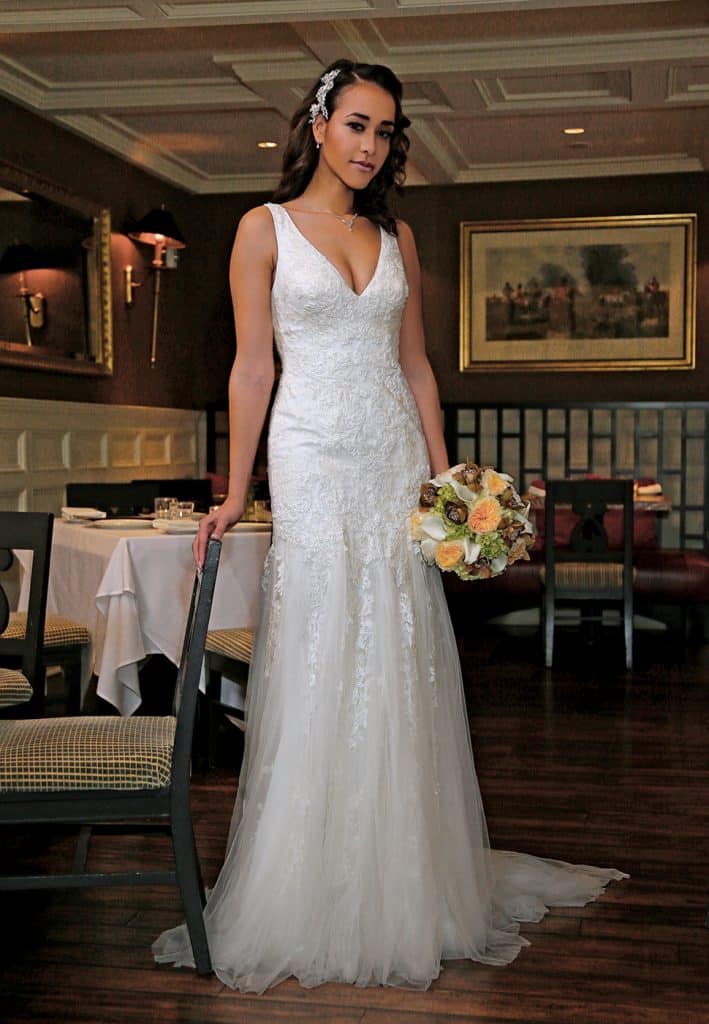 Gown: Oleg Cassini at David's Bridal (CWG795, $1,158), Ariston Flowers, Jewelry: David's Bridal