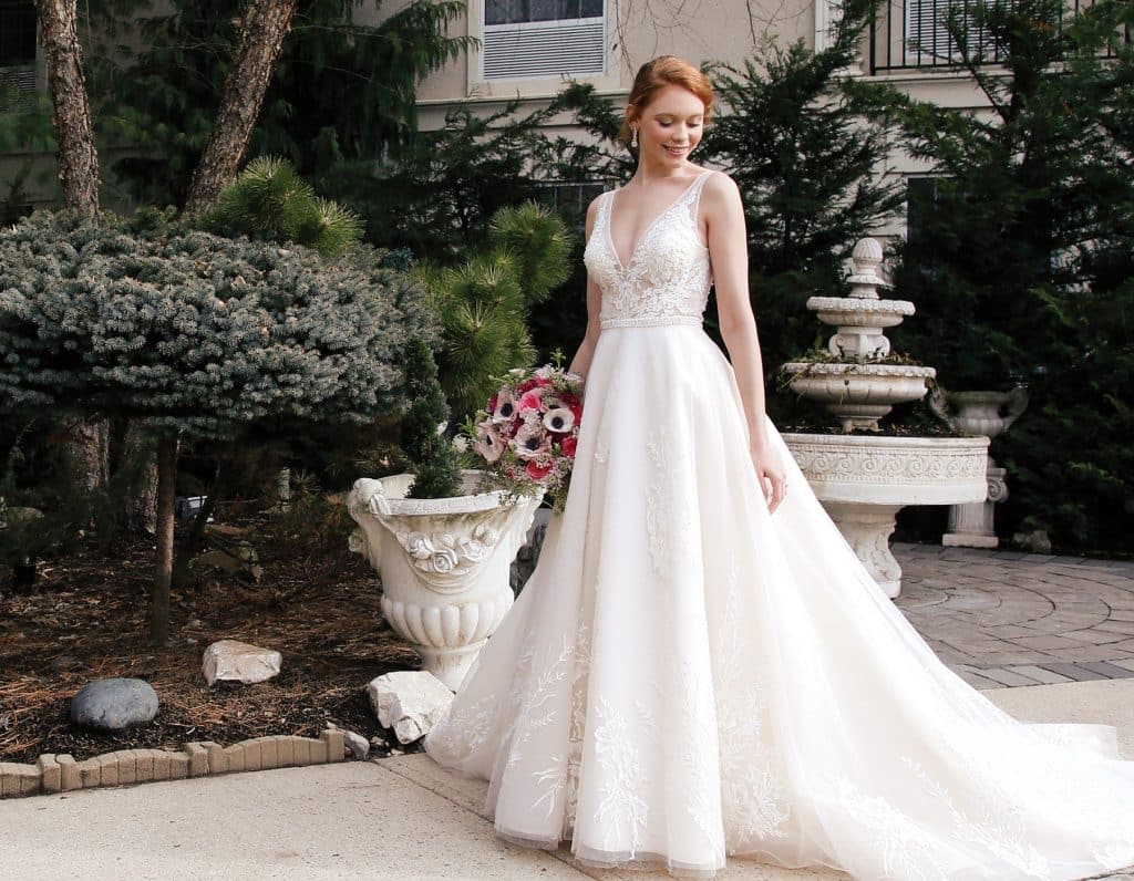 Gown: Bossina Signature (BC8501, $2200). Bouquet: Mitch Kolby Events