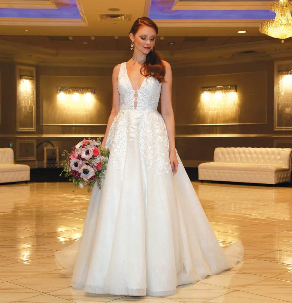 Gown: Jude Jowilson (Olivia). Bouquet: Mitch Kolby Events