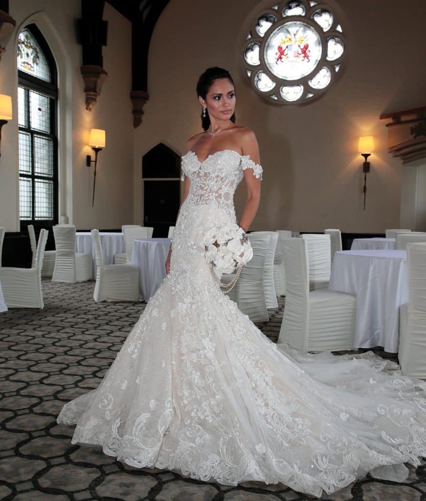 Gown: Eve of Milady (4367). Bouquet: Forever Brooch Bouquets.