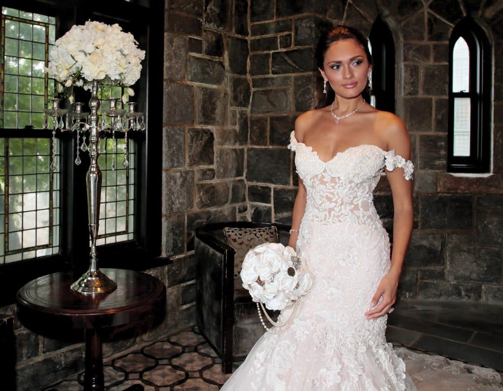 Gown: Eve of Milady (4367). Bouquet: Forever Brooch Bouquets.