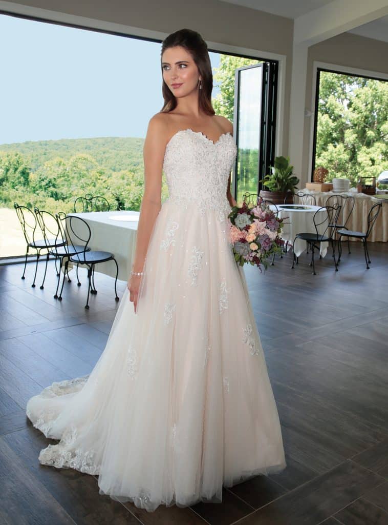 Gown: Bossina Signature (BC637) at Bossina Couture. Hair Jewelry: Ciro's Hair Pavilion. Bouquet: Mitch Kolby Events.
