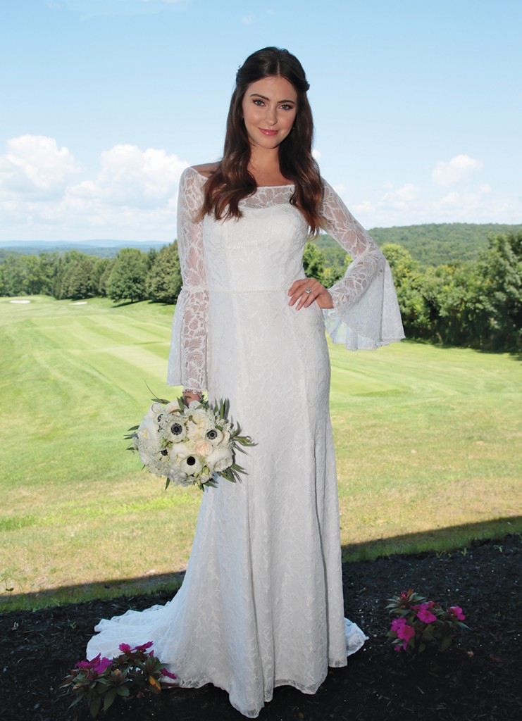 Gown: Galina (WG3949, $499) at David's Bridal. Bouquet: Mitch Kolby Events.