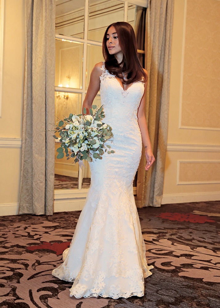 Gown: Bossina Couture (BC621, $1800). Bouquet: Douglas Koch Designs Ltd.