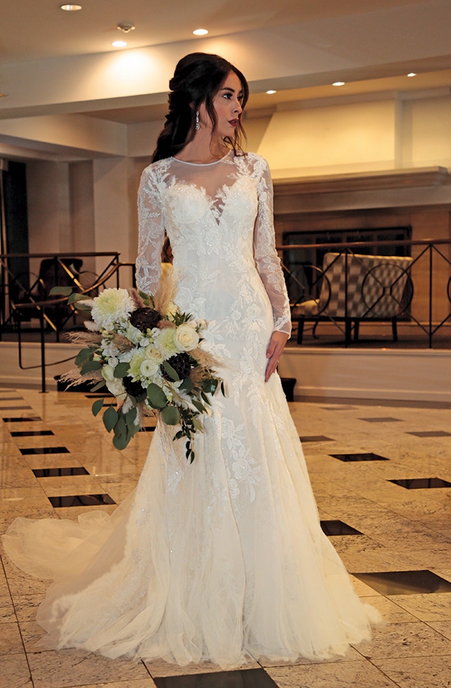 Gown: Oleg Cassini (CWG844, $1399) at David's Bridal. Bouquet: Douglas Koch Designs Ltd.