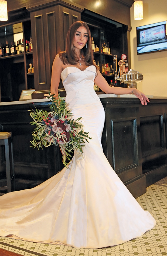 Gown: Jude Jowilson (Joan). Bouquet: Douglas Koch Designs, Ltd.