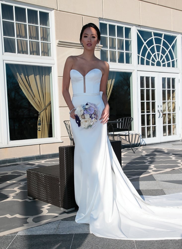 Gown: Jude Jowilson (Kelly). Bouquet: Forever Brooch Bouquets.