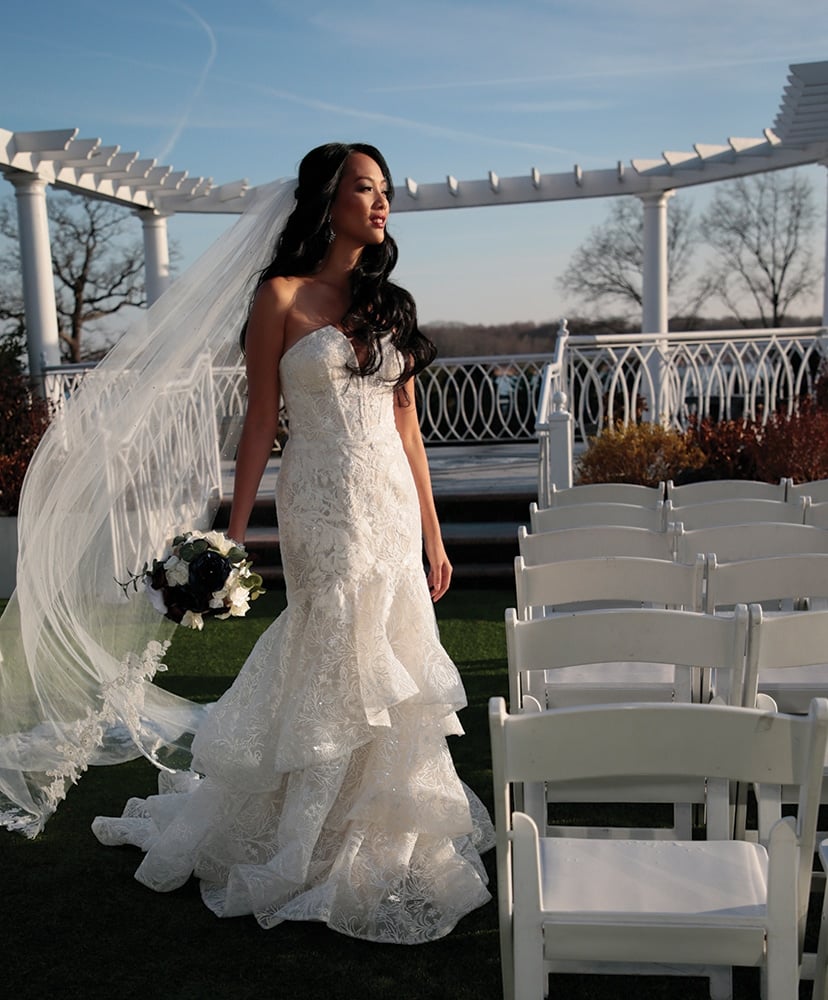 Gown: Oleg Cassini (CWG846, $1499) at David's Bridal. Bouquet: Forever Brooch Bouquets.
