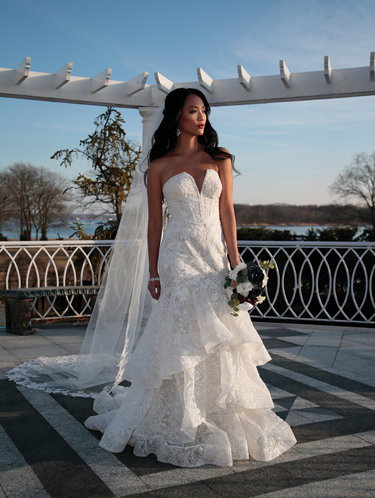 Gown: Oleg Cassini (CWG846, $1499) at David's Bridal. Bouquet: Forever Brooch Bouquets.