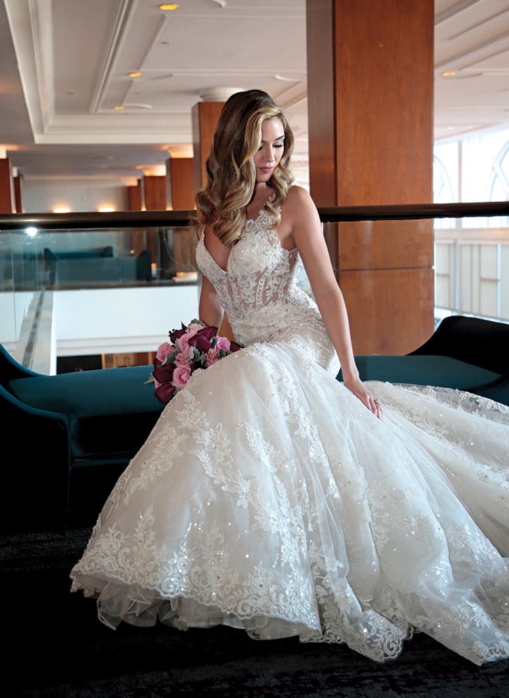 Gown: Eve of Milady (1634).Bouquet: Ariston Flowers.