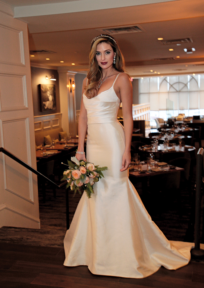 Gown: Jude Jowilson (Taylor). Bouquet: Ariston Flowers.