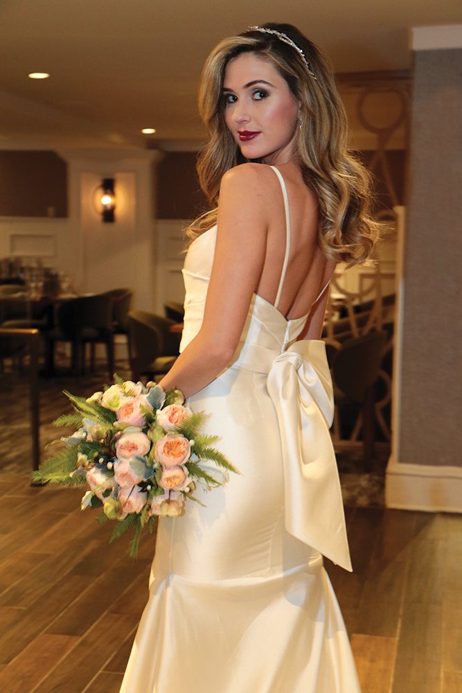 Gown: Jude Jowilson (Taylor). Bouquet: Ariston Flowers.