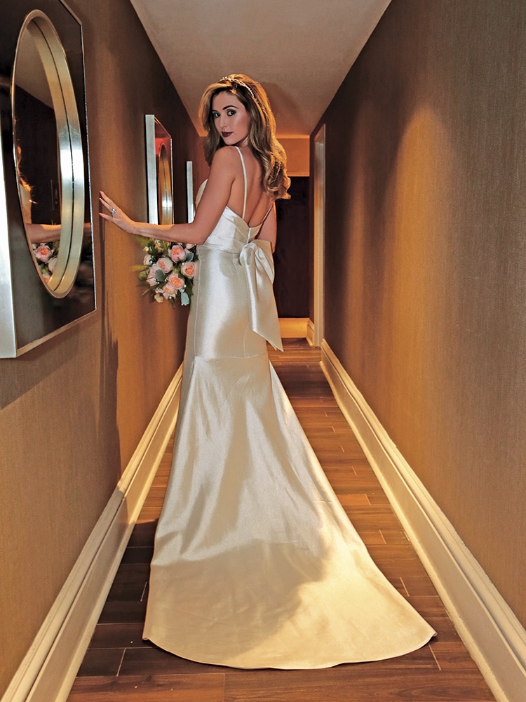 Gown: Jude Jowilson (Taylor). Bouquet: Ariston Flowers.
