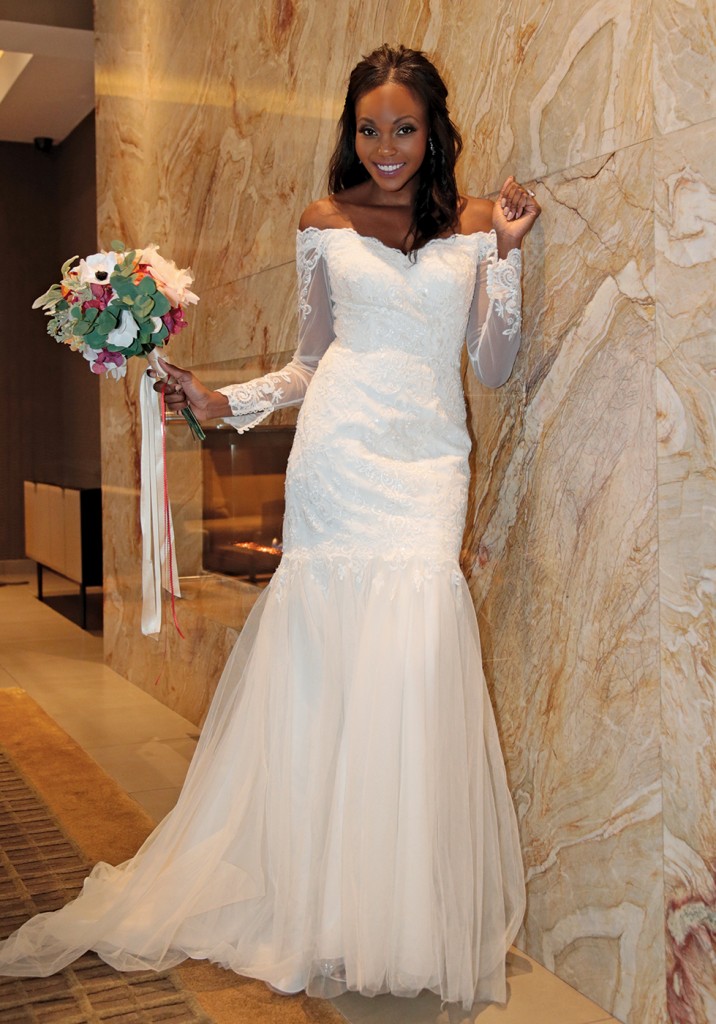 Gown: David's Bridal (WG3943, $649). Bouquet: Forever Brooch Bouquets.