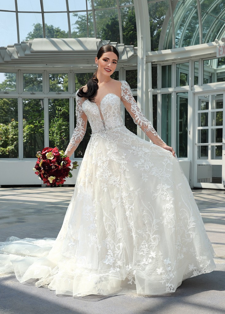 Gown: Eve of Milady (4379). Bouquet:  Ariston Flowers.