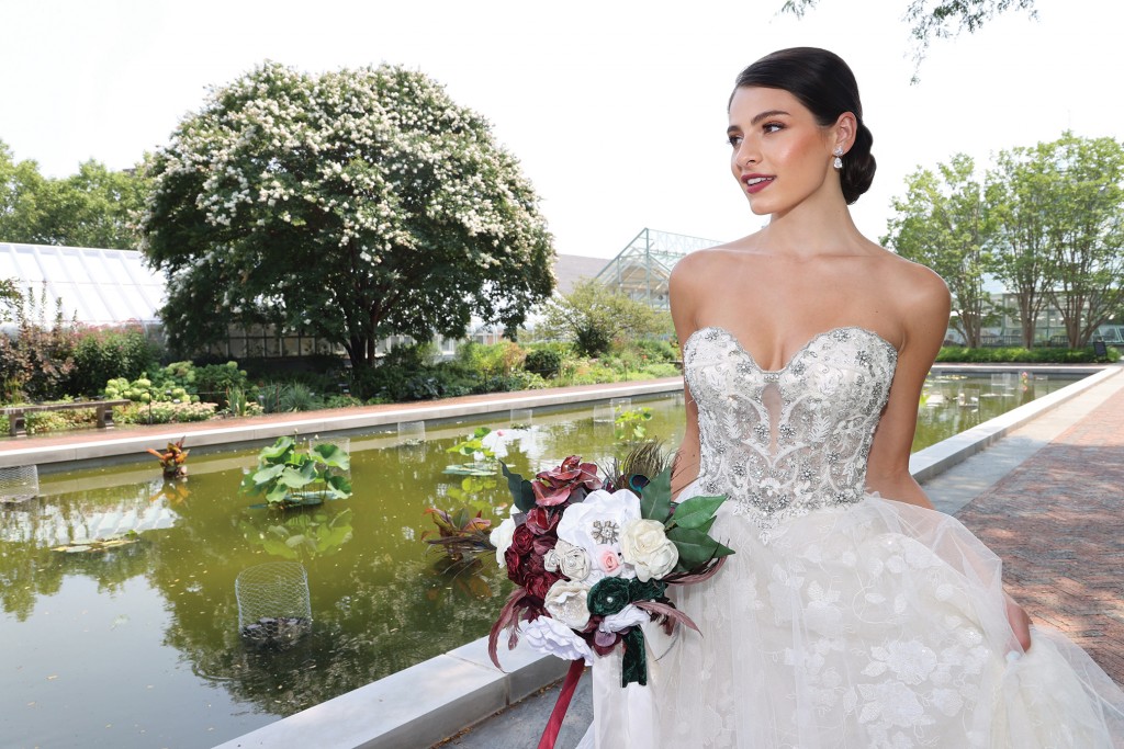 Gown: Eve of Milady (4368). Bouquet: Forever Brooch Bouquets.