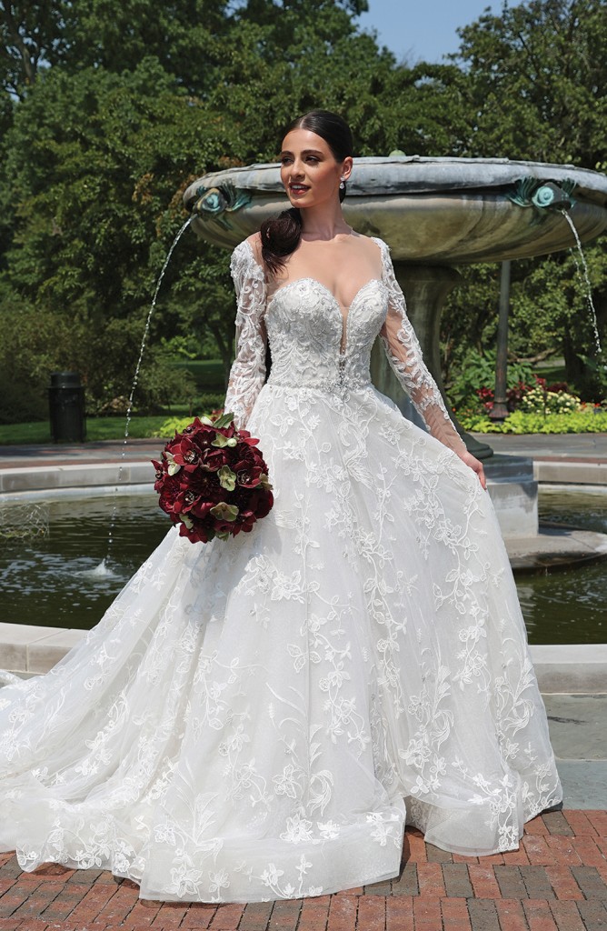 Gown: Eve of Milady (4379). Bouquet: Ariston Flowers.