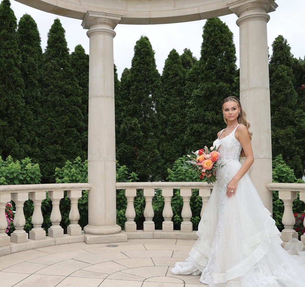 Gown: Amalia Carrara (378). Bouquet: Bespoke Floral.