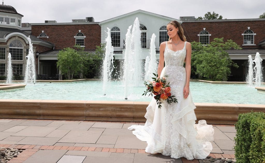Gown: Amalia Carrara (378). Bouquet: Bespoke Floral.