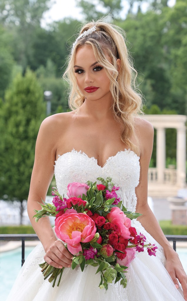 Gown: Bossina Couture (Eliora). Bouquet: Bespoke Floral.