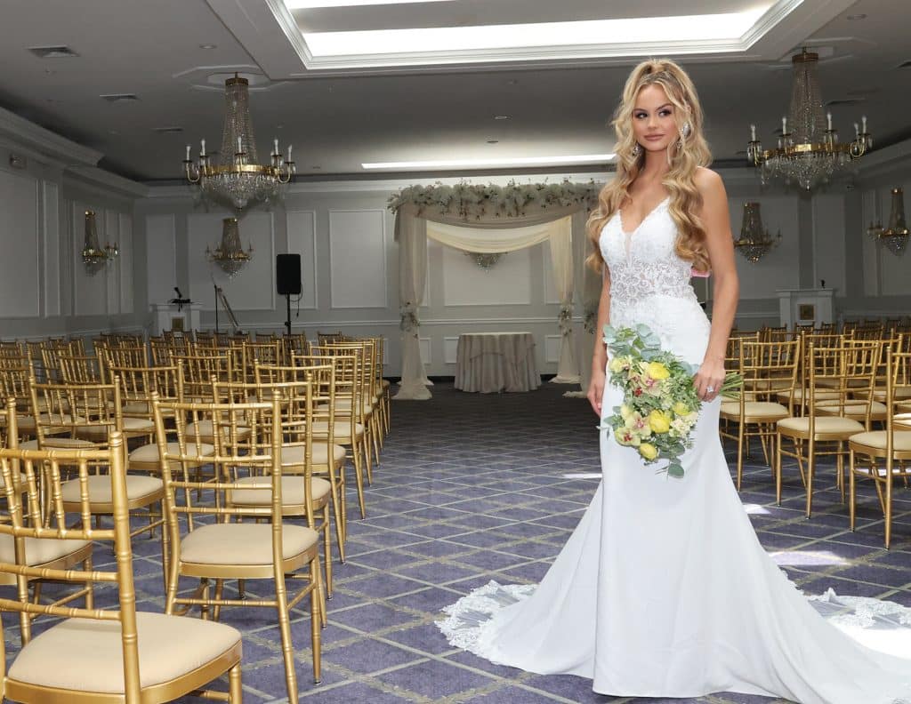 Gown: Bossina Couture (Stella). Bouquet: Bespoke Floral.