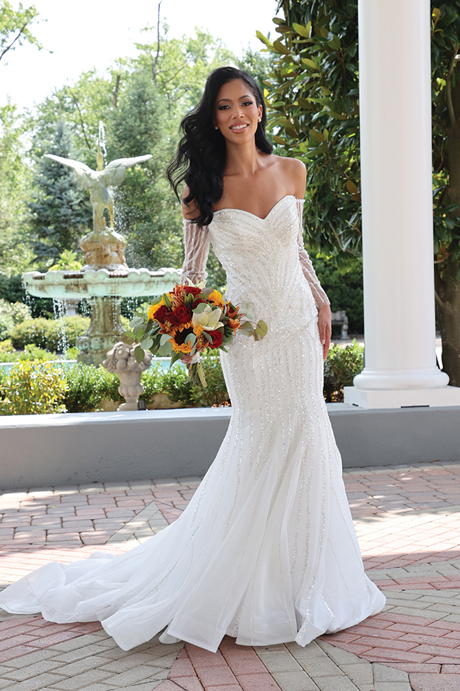 Gown: Dream Couture by Laura (Sabrina). Bouquet: Henry's Florist Wedding Events.