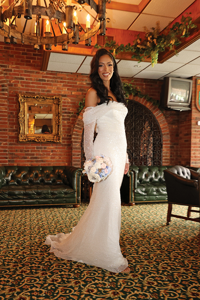 Gown: Dream Couture by Laura (Viviana). Bouquet: Forever Brooch Bouquets.