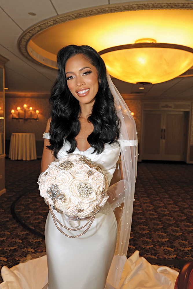 Gown: Dream Couture by Laura (Ariana). Bouquet: Forever Brooch Bouquets.