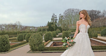 Gown: Eve of Milady (4402). Bouquet: Ariston Flowers.